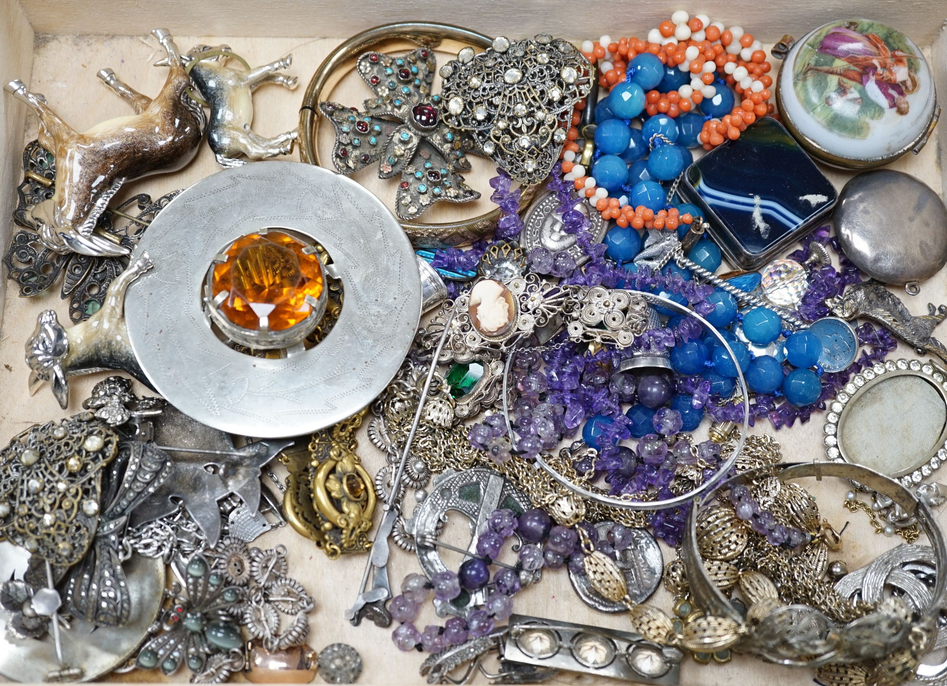 A group of assorted mostly costume jewellery including a Scottish brooch